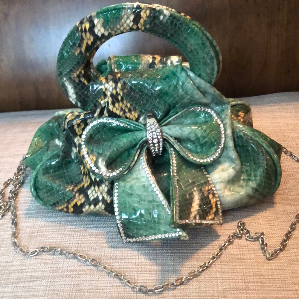 Green and tan snakeskin patterned handbag